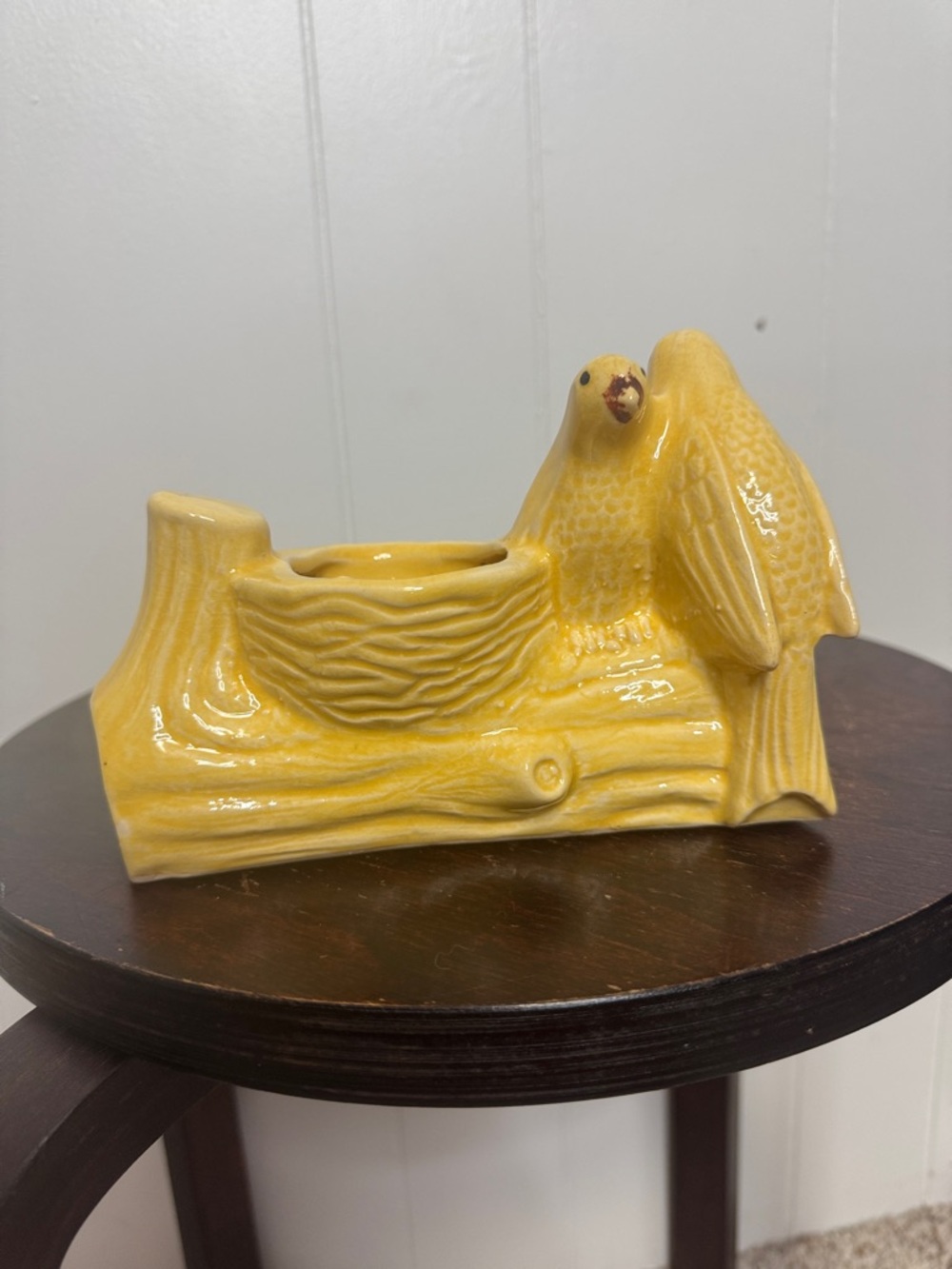 Vintage yellow glazed ceramic bird with nest figurine